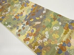 唐織に萩・芝・葉模様織出し袋帯